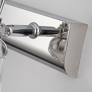 Brushed silver LED bathroom vanity sconce close-up — modern lamp