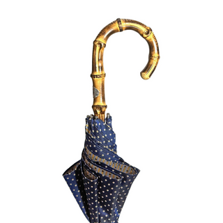 Bamboo handle dot pattern handcrafted Italian artisan umbrella canopy detail