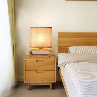 Premium table lamp wooden base — classic linen shade close-up