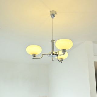 Medieval iron chandelier ambient — designer glass warm glow