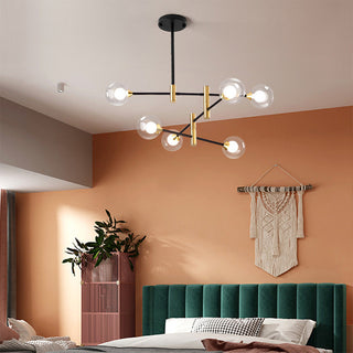 Modern round glass sputnik chandelier detail — iron hanging warm