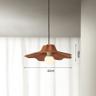 Resin alien pendant lamp detail — organic metal ceiling fixture