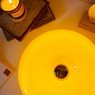 Orange donut lamp illuminated — cute glass LED warm