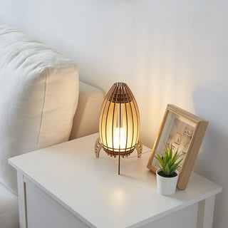 Wooden rocket lamp curved slats — modern desk light close-up