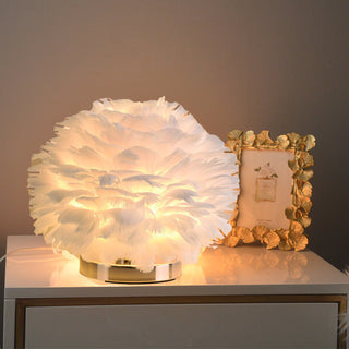 Feather lamp side angle — plush rounded elegant glow