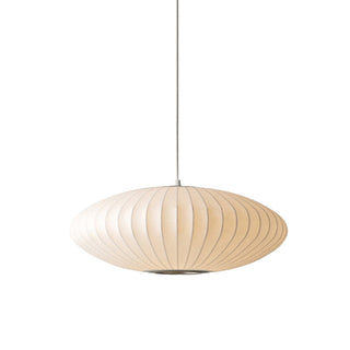 Simple modern saucer pendant over kitchen counter