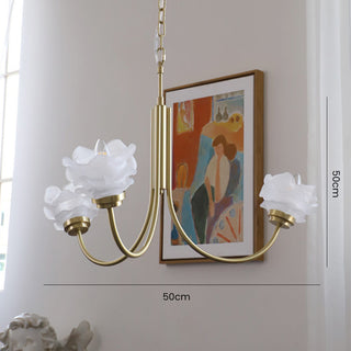 French brass rose chandelier detail — vintage 3-light warm texture