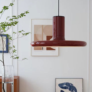 Red saucer pendant from below — modern metal dining fixture