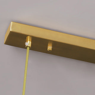 Modern crystal raindrop pendant styled — elegant gold fixture