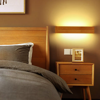 Rustic wood bathroom vanity wall lamp illuminated — LED