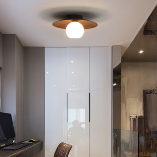 Natural wood ceiling lamp close-up, modern warm bedroom light