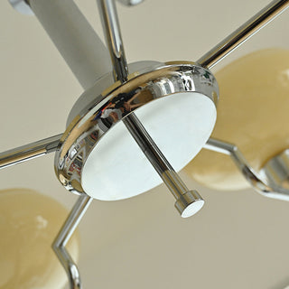 Medieval iron chandelier detail — designer glass warm ambient