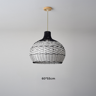 Handwoven rattan pendant side view — adjustable hanging fixture