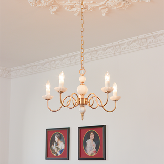 Vintage cream metal glass chandelier front — soft warm dining warm
