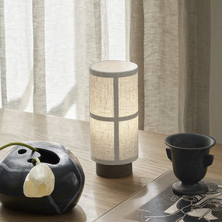 Natural fiber cylinder table lamp — close-up elegant detail
