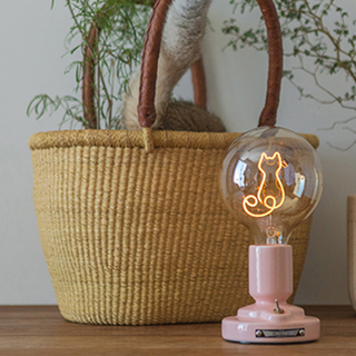 Pink white cat lamp close-up — LED warm detail