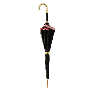 Classic brass handle red circles handmade Italian umbrella close-up