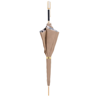 Macchioline spotted design acetate handle handmade Italian umbrella close-up
