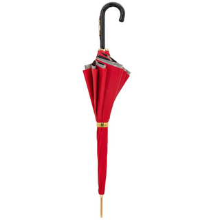 Red equestrian bridles leather stirrup handle handmade Italian umbrella close-up