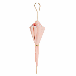 Luxury designer handmade Italian jeweled handle pink umbrella close-up