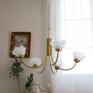 Vintage rose brass chandelier close-up — French 3-light glass detail