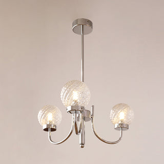 Glass ball chandelier close-up — modern iron luxury detail