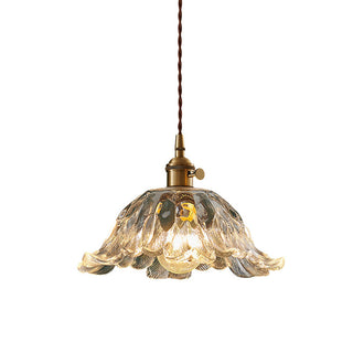 Brass flower pendant detail — clear glass creative ceiling fixture