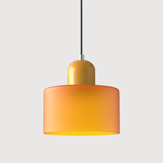 Glass Bauhaus pendant casting warm kitchen island glow