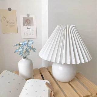 Scandinavian rattan LED lamp illuminated — vintage warm glow