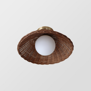 Bamboo rattan wall sconce close-up — rustic eco globe lamp