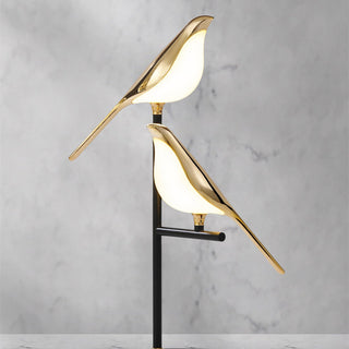 Golden bird lamp close-up — alloy acrylic touch detail