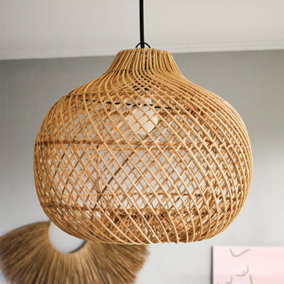 Handmade wicker basket pendant over living room table