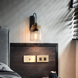 Glass funnel shade industrial wall sconce detail — modern