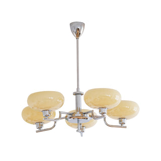 Medieval designer iron chandelier front — glass warm glow