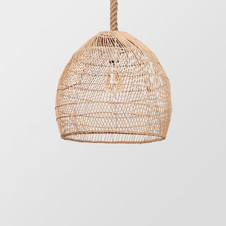 Rattan and hemp rope pendant over dining room table