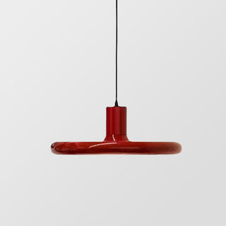 Red metal pendant close-up — saucer shape dining ceiling lamp