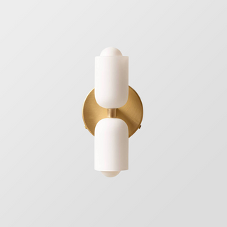 Elegant creamy double head modern wall sconce detail — indoor