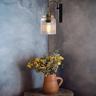 Modern industrial funnel glass wall lamp illuminated — sconce
