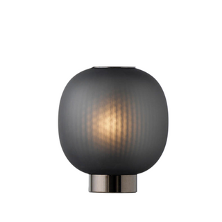 Minimalist ball lamp side angle — warm ambient light
