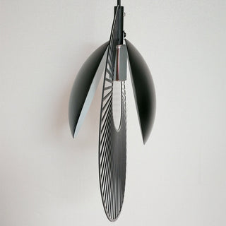 Black metal pendant top view — minimalist dining room ceiling fixture