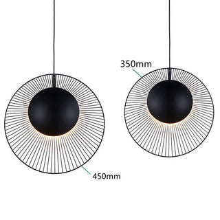Black metal pendant light close-up — minimalist dining ceiling fixture