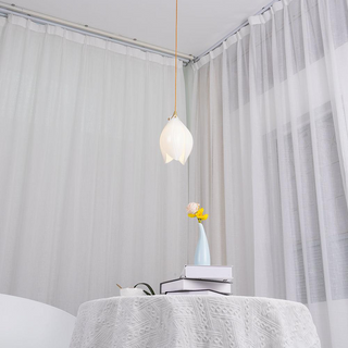 Multi-head bloom pendant side view — creative dining fixture