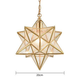 Glass star pendant casting light in hallway