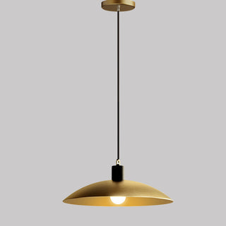 Antique brass pendant lamp close-up — bell shaped shade dining fixture