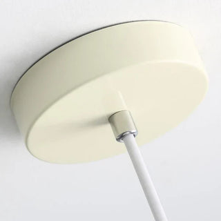 Rustic pendant with soft cream shade and warm ambient light