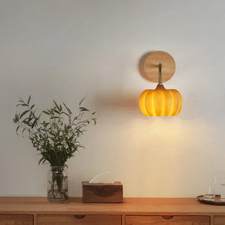 Yellow resin pumpkin wall light detail — decorative sconce lamp