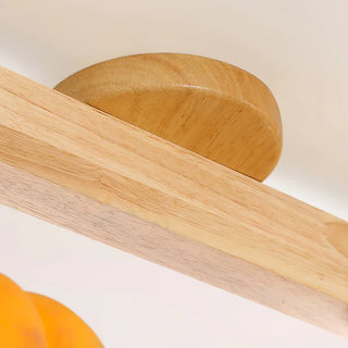 Yellow eco pumpkin ceiling fixture – resin wood installed view