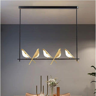 LED pendant lamp with circular form and gold bird accent
