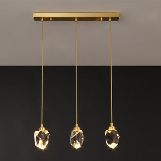Raindrop crystal pendant close-up — modern elegant gold lamp