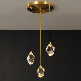 Crystal chandelier side view — modern raindrop gold fixture